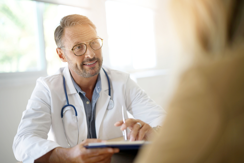 Doctor,With,Patient,In,Medical,Office