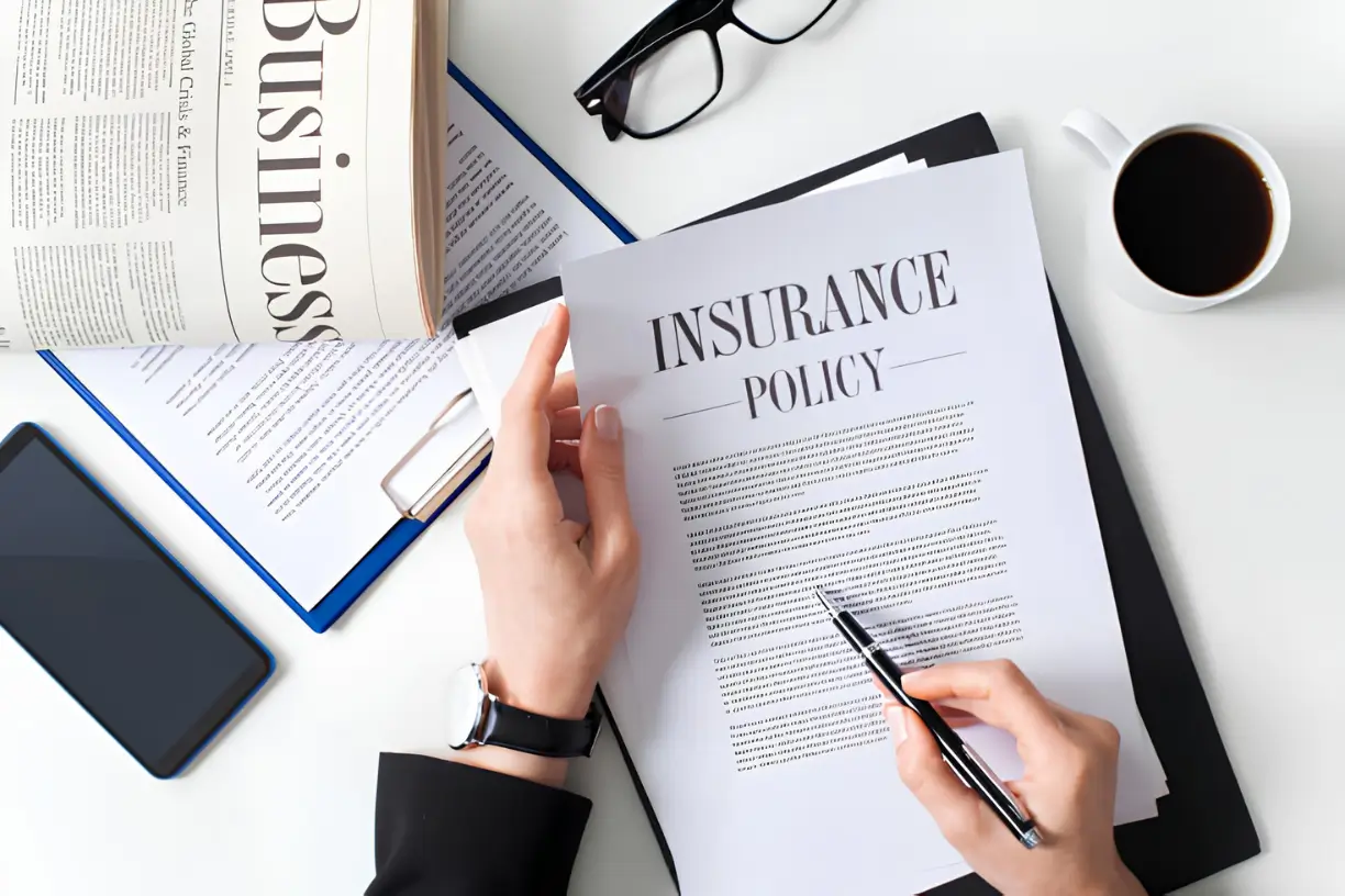 commercial-general-liability-insurance-cost-texas-policy-review A business owner reviews an insurance policy to understand commercial general liability insurance cost in Texas.